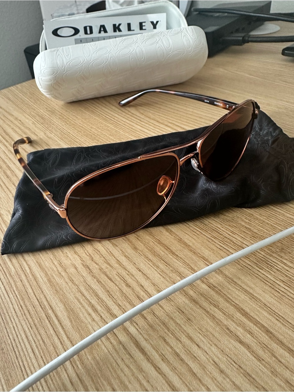Oakley Rose Gold Metal Aviator Sunglasses with Brown Lenses